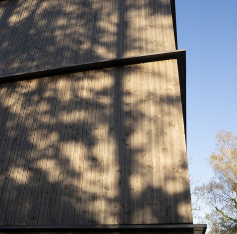 Vier Mehrfamilienhäuser aus Holz in Hohenbrunn bei München | © Carolin Hirschfeld