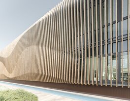 Facciata moderna in legno per edificio aziendale. | © Davide Perbellini