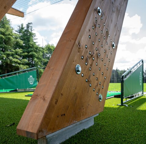 Campo pratica golf in legno a Bergamo | © Indie Studio